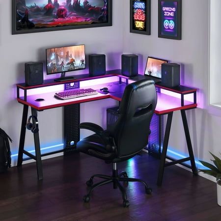 a computer desk with two monitors and a keyboard