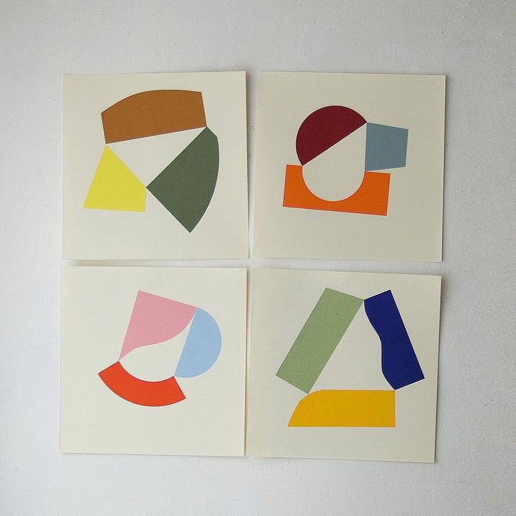 four pieces of paper with different shapes on them, one is white and the other is multicolored