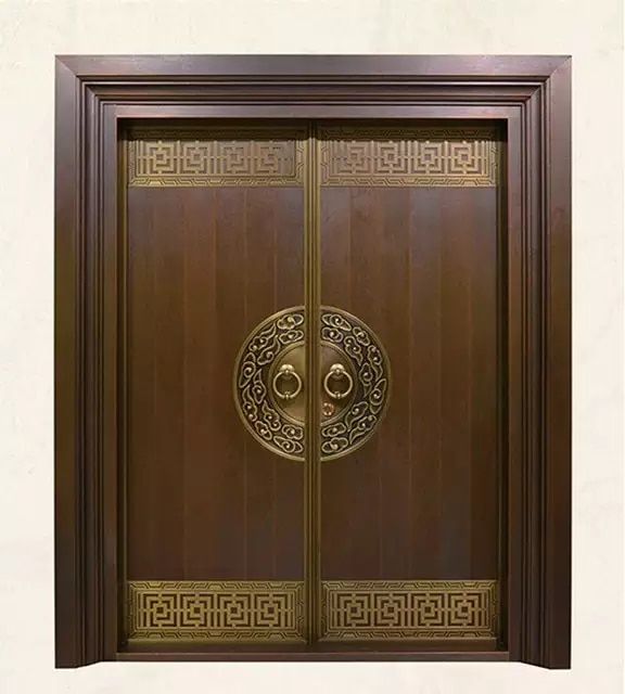 the door is made of wood and has an intricate design