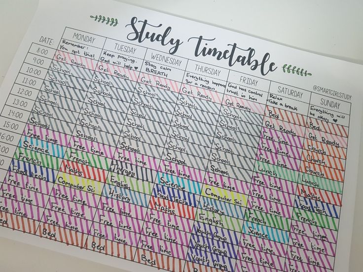 a poster with the words study timetable written in different colors and sizes, on top of a white table