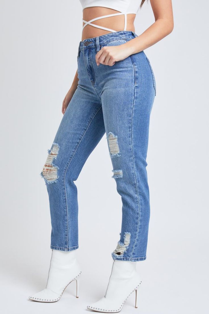 Dive into your chill era with our Women's Dream High Rise Mom Fit Jeans. This high-waisted jean is made with our signature hybrid Dream Denim that has a pure cotton front panel for that perfect denim texture, and a high-stretch back panel for ultimate comfort and a butt-hugging look. Features a classic five pocket construction, distressing, single-button closure with front zip, and belt loops. Style with a fitted crop and sneakers for an everyday look you'll love. Product Details- High-Rise- Bel High Rise Medium Wash Distressed Jeans, High Rise Distressed Medium Wash Jeans, Distressed High Rise Jeans In Medium Wash, High Rise Cropped Jeans In Medium Wash, Trendy Medium Wash Cropped Denim Jeans, Distressed Denim Cropped Jeans, Distressed Dark Wash Cropped Jeans In Rigid Denim, Trendy High Rise Medium Wash Jeans, Trendy High Rise Medium Wash Cropped Jeans