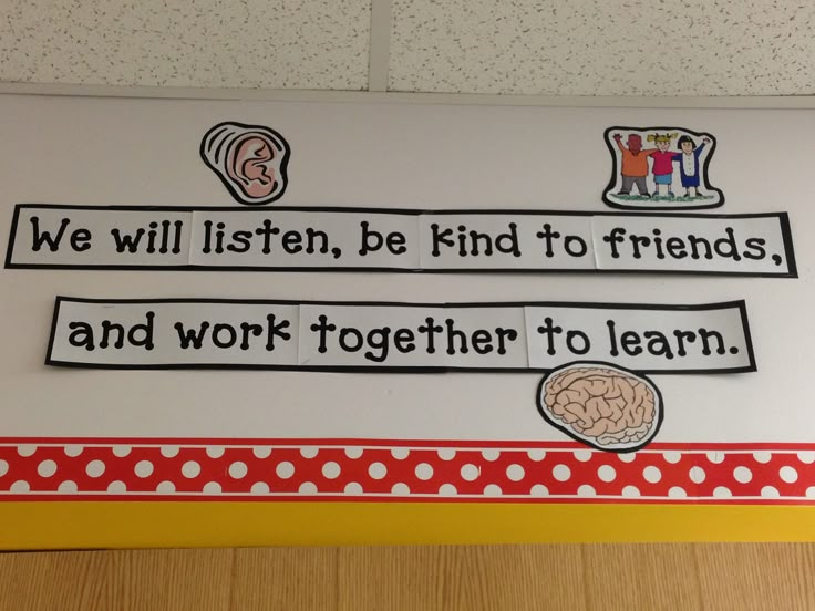 a sign that says we will listen, be kind to friends and work together to learn