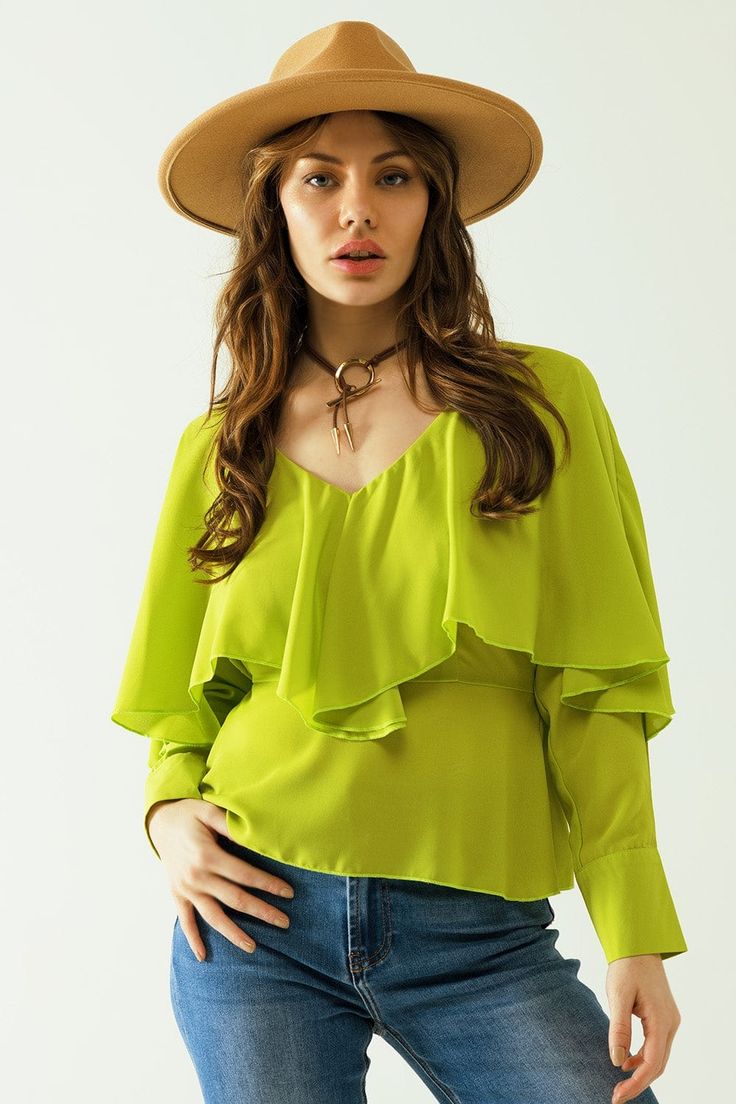 Introducing our Green Long Sleeve Top with a Ruffle Detail and Bare Back – a chic and playful addition to your wardrobe, designed to make a statement at any party or special occasion.  This light green top features a stylish V-neck neckline and long sleeves, creating an elegant and sophisticated look. The ruffle detail adds a touch of femininity and charm, enhancing the overall appeal of the top.  Perfect for a party, the open tie back design provides a daring and stylish element to your ensemble. The chiffon fabric, composed of 100% polyester, adds a light and airy feel, ensuring comfort while making a fashion statement.  Button details on the sleeves add a subtle touch of sophistication, complementing the overall design. The regular fit ensures a flattering silhouette, while the relaxed Top Verde, Blouse Collar, Green Long Sleeve Top, Sleeves Style, Style Party, Green Long Sleeve, Lightweight Tops, Green Tops, Feminine Look