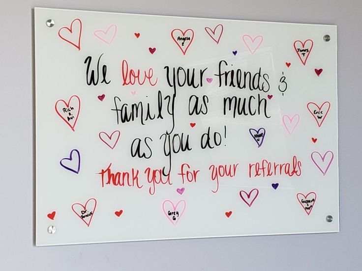 a white sign with writing on it that says we love your friends family as much as you do