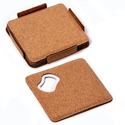 two cork coasters with a computer mouse on one side and a leather pad on the other