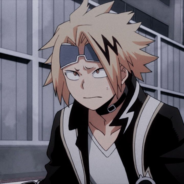 an anime character with blonde hair and eye glasses looking at something in front of him