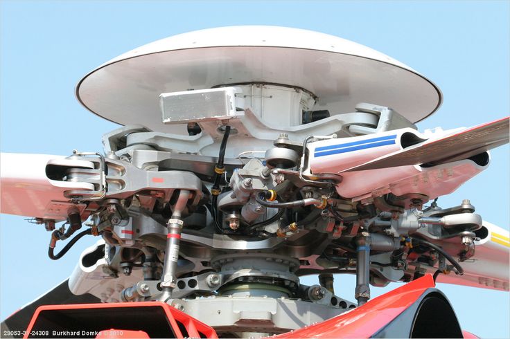 the engine of an airplane is visible from below