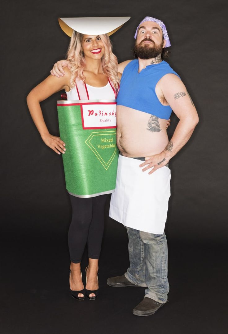 a man and woman dressed up in costumes