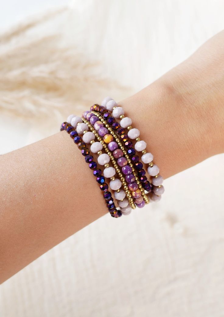 This gorgeous handmade bracelet is made by multi strand beaded in shade of purple color combination  So it's very comfortable to wear and perfect for everyday look. and it will be a good gift for friends or bridal party gifts   >>Dimension<<   Length:  Size 20 cm Width: 2.5cm Weight: about 10 grams *If you are not sure about size please feel free to contact me I would be happy to help Lavender Bracelets With Spacer Beads As Gift, Lavender Bracelets With Spacer Beads For Gift, Bohemian Purple Beaded Bracelets Hand Wrapped, Adjustable Hand-wrapped Purple Beaded Bracelet, Hand Wrapped Purple Bracelets, Bohemian Purple Hand Wrapped Beaded Bracelets, Purple Bohemian Hand Wrapped Beaded Bracelets, Purple Hand-strung Beaded Bracelets As Gift, Hand-strung Purple Beaded Bracelet For Gift