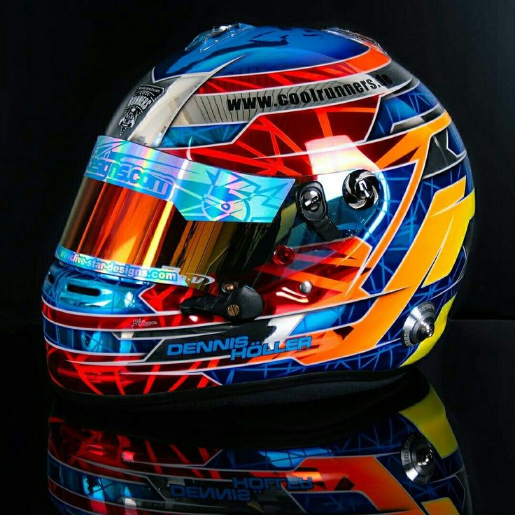 a helmet is shown on top of a reflective surface