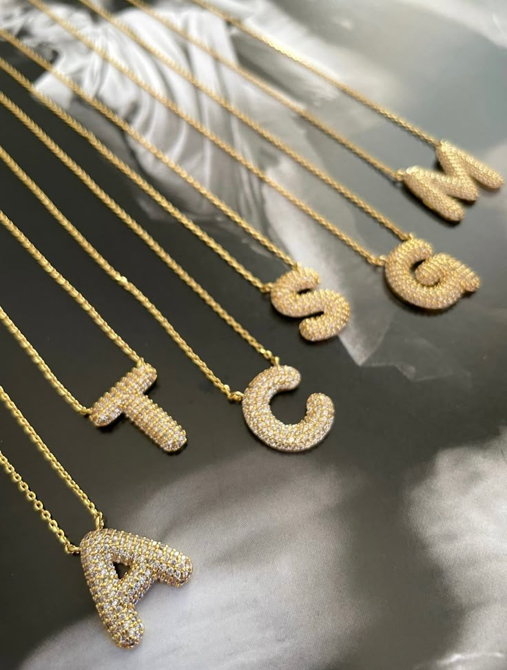 A perfect gift for any special occasion, our Chunky Sparkling Letter Necklace captures the recipient's personalities with its delicate gold filled necklace with micro pave chunky letters. It's the perfect addition to a stylish and timeless look. Chunky Letters, Carrie Necklace, Casual Jewellery, Body Accessories, Bottle Charms, Letter Pendant Necklace, Heart Hoop Earrings, Gold Filled Necklace, Accessory Ideas