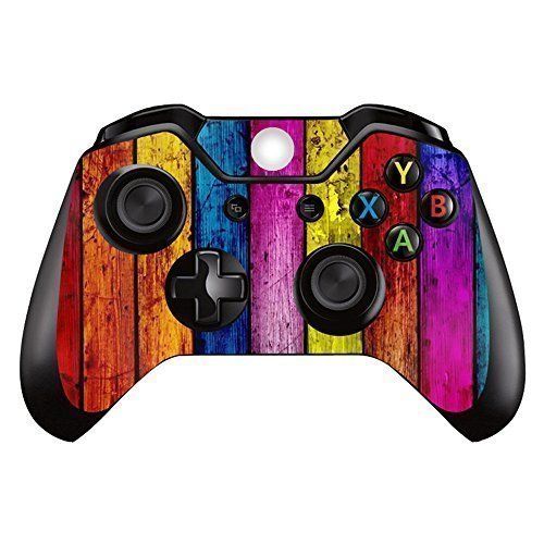 a colorful wooden texture skin for the nintendo wii game console controller, which is painted in rainbow colors