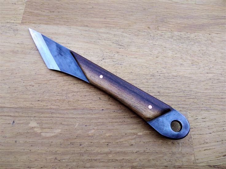 a knife that is sitting on top of a table