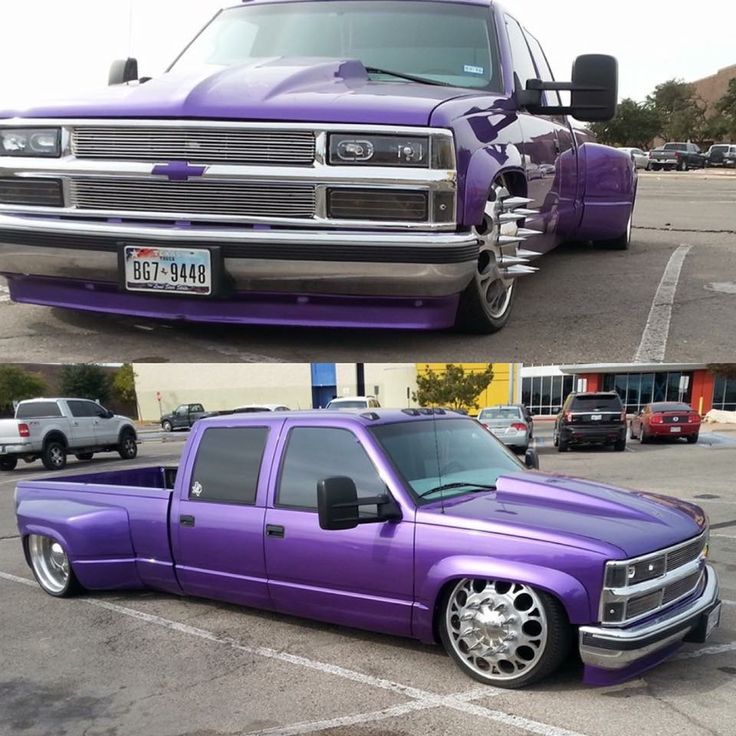 the purple truck is parked in the parking lot next to the silver truck with chrome rims