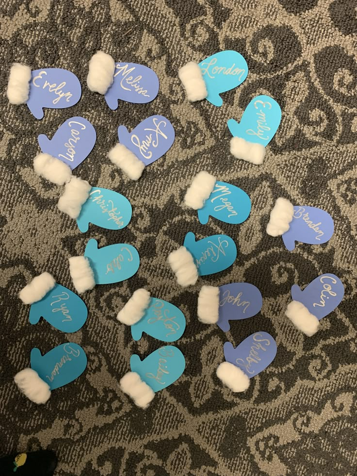 blue and white heart shaped marshmallows on a carpet