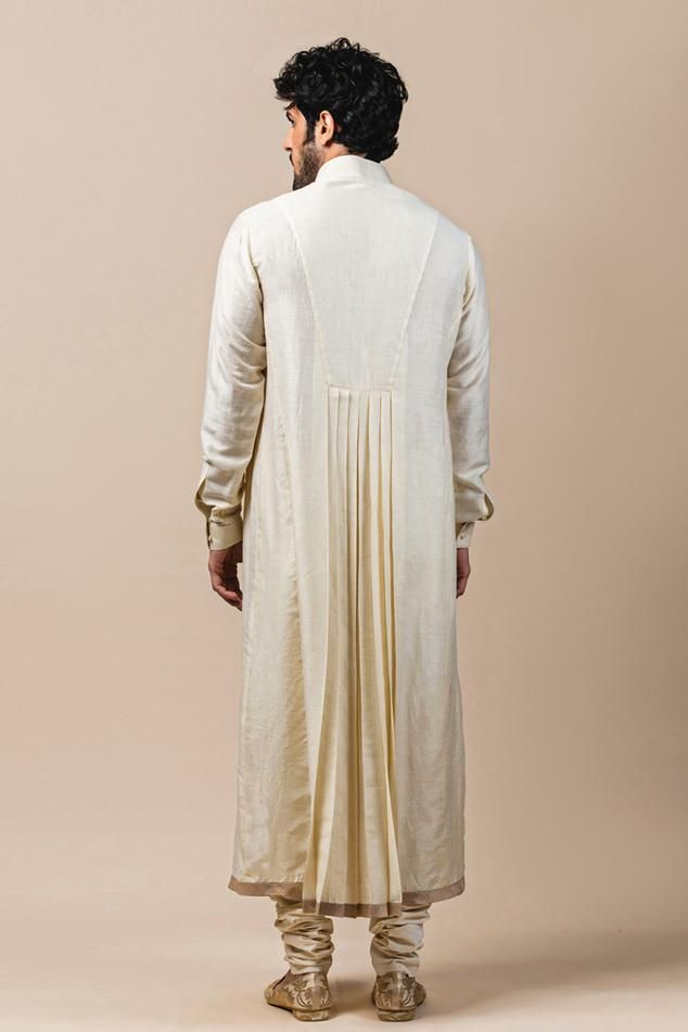 Ivory flared long kurta with pleated front, panelled yoke, button placket and cuff sleeves. Comes with churidar. Kurta Set Men, Kurta Set For Men, Long Kurta, Men Kurta, Nehru Jacket, Tarun Tahiliani, Pant Sets, Skirt Sets, Churidar