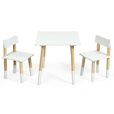 two chairs and a table are shown against a white background