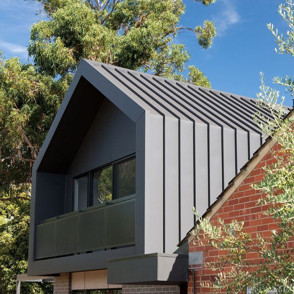 an image of a house with metal roofing