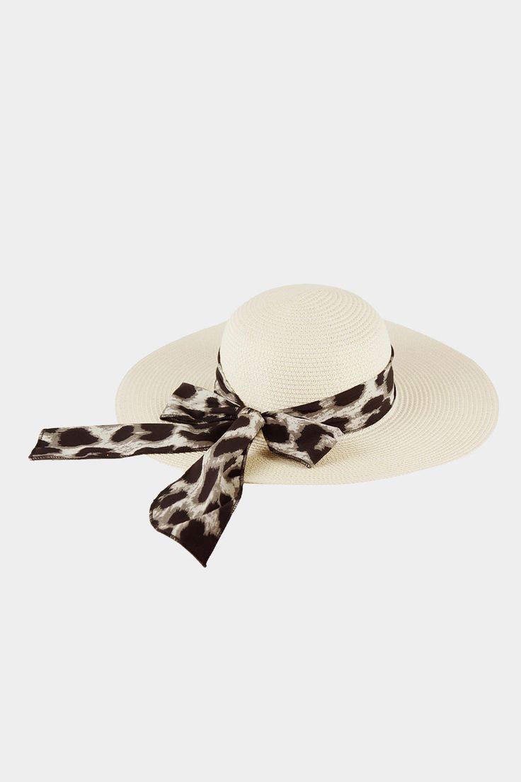 This is a great straw hat for day time summer events and the beach. Leopard print band with large back bow. Adjustable ribbon on the inside for the stay-put feature. Brim is 4.5" wide. Note that the ribbon shows the reinforcement on edges. Summer Boater Hat With Bow For Spring, Summer Straw Boater Hat With Bow, Summer Straw Hat With Bow, Summer Straw Hat With Bow And Short Brim, Summer Straw Hat With Short Brim And Bow, Summer Straw Hat With Bow For Vacation, Spring Summer Straw Hat With Bow, Summer Straw Hat With Bow For Spring, Spring Vacation Boater Hat With Bow