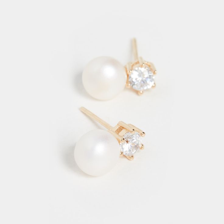 Baby Bliss Earring | SHASHI Pearl Studs Classic 14k Gold-filled Pearl Pendant Earrings, Delicate Yellow Gold Pearl Earrings Set, Classic 14k Gold Filled Pearl Earrings, Classic 14k Gold-filled Pearl Earrings, Classic Gold Bridal Earrings, Classic Pierced Bridal Earrings As Gift, Delicate 14k Gold Earrings For Formal Occasions, Elegant Formal 14k Gold Filled Pearl Earrings, Elegant 14k Gold-filled Pearl Earrings For Formal Occasions