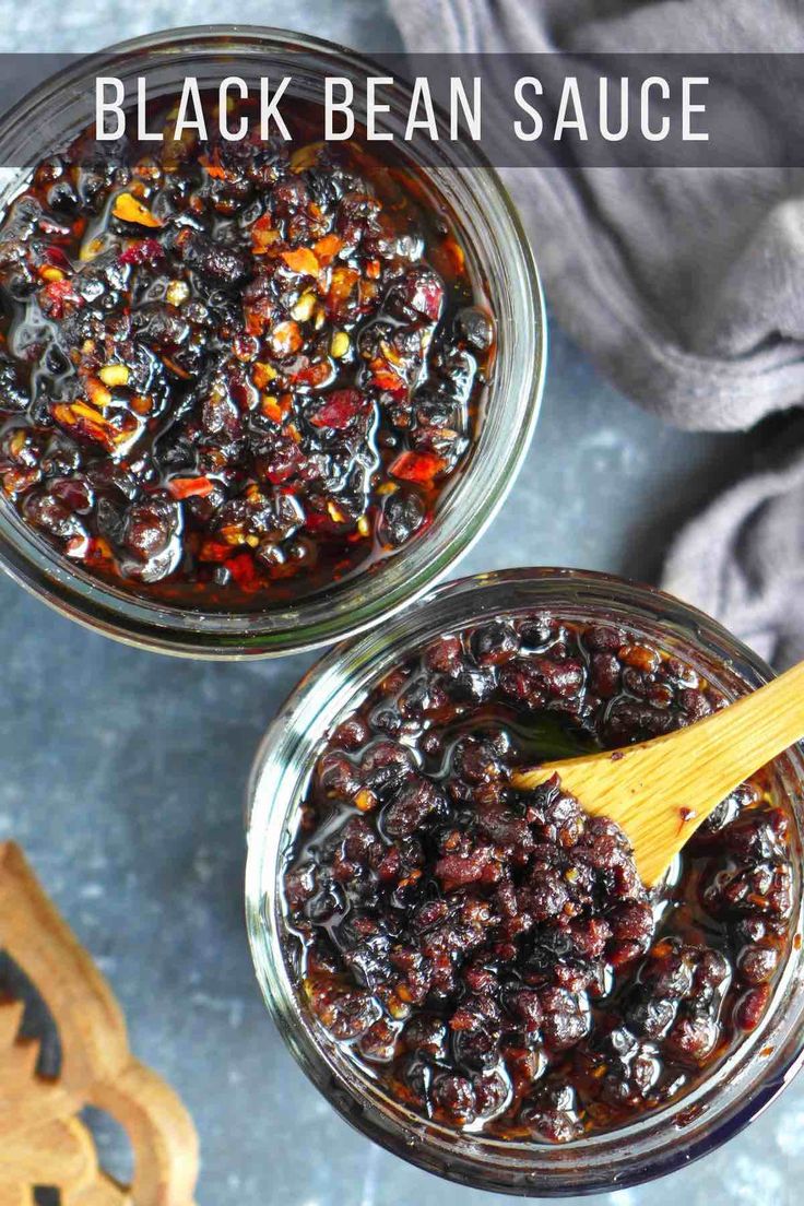 two glass jars filled with black bean sauce