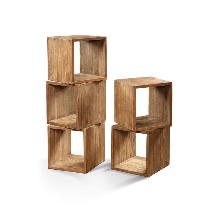 three wooden cubes stacked on top of each other