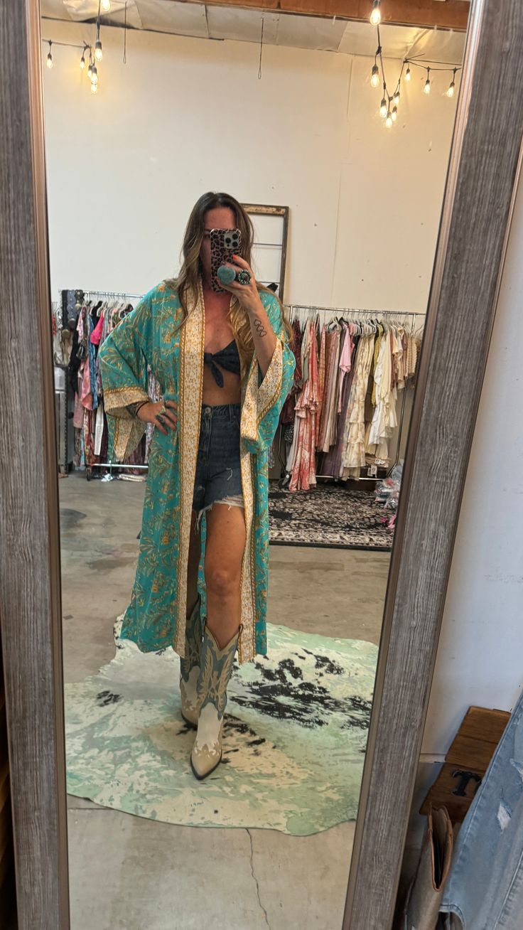 Upgrade your wardrobe with the Spelly kimono. Featuring a matching belt and oversized Boho bell sleeves, this long bohemian piece will add a touch of effortless style to any outfit. Elevate your look with this versatile and on-trend kimono. Spring Hippie Kaftan, Oversized Open Front Festival Kaftan, One Size Long Boho Print Kimono, Oversized Wrap Kaftan For Festival, One Size Bohemian Open Front Kimono, Hippie Style One-size Kimono, Bohemian Spring Kimono One Size, One Size Tunic Kaftan For Spring, Bohemian Flowy Long Sleeve Kimono