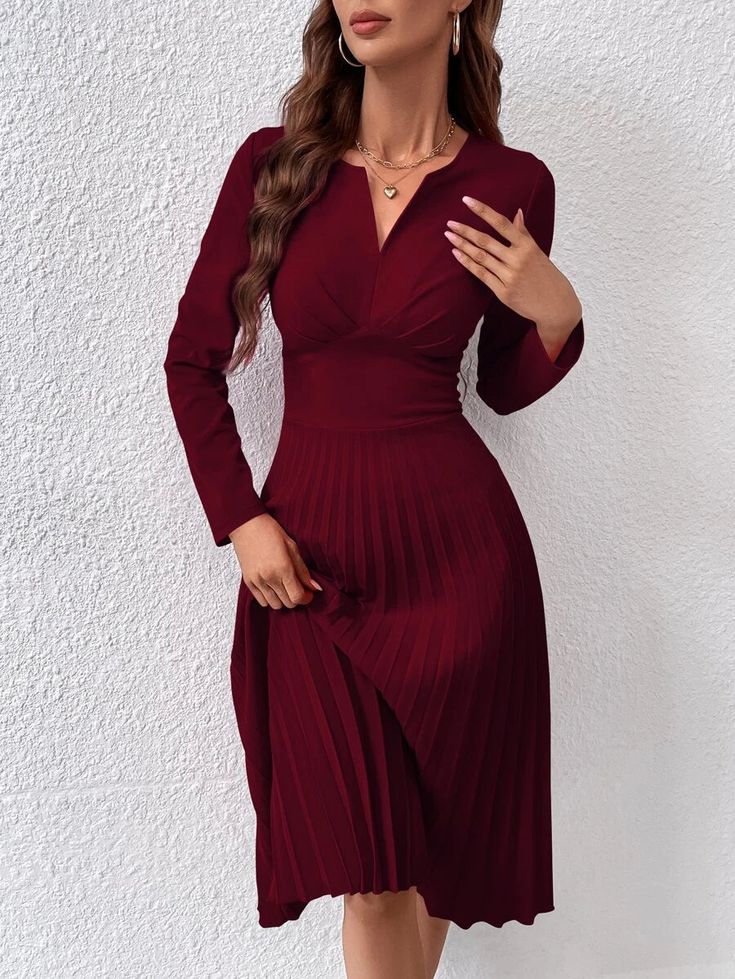 Experience pure elegance with our Barbie Notched Elegant Pleated Hem Dress. Made from a knitted fabric with a slight stretch, this dress provides both comfort and a flawless fit. The pleated details add an extra touch of sophistication, while the long sleeves and regular fit make it appropriate for any occasion. Whether you're attending a formal event or a casual get-together, this graceful midi dress will effortlessly enhance your style. Embrace timeless charm and grace with this piece. Feature Comfy Jumpsuits, Notched Neckline, Women Midi, Hem Dress, Womens Midi Dresses, Dress P, Shoulder Sleeve, Formal Event, Knitted Fabric