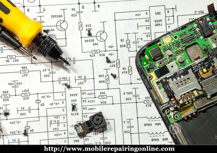 tools are laying on top of the printed circuit board