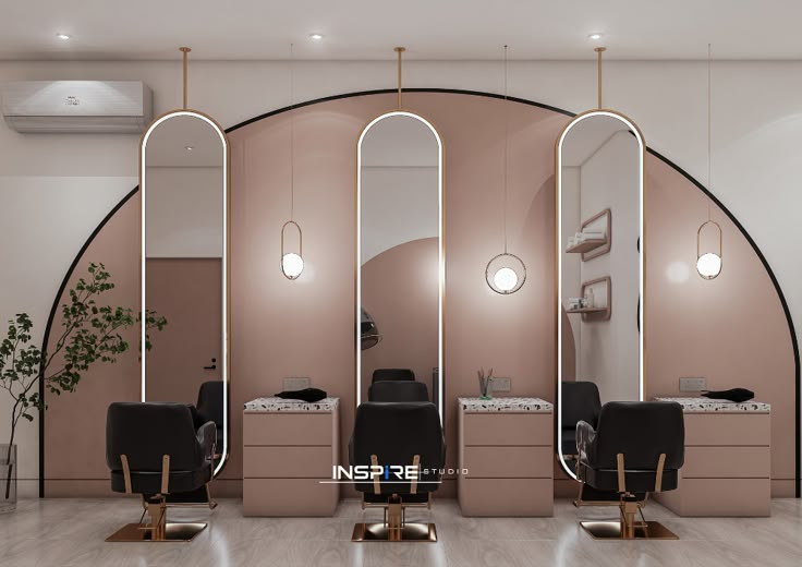 the interior of a hair salon with mirrors and chairs in front of it, along with lights