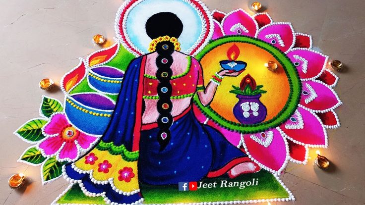 an artistic painting on the ground with lights and decorations around it for diwaling