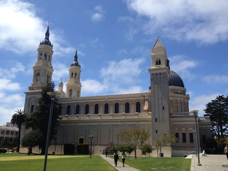 a large building with two towers on top