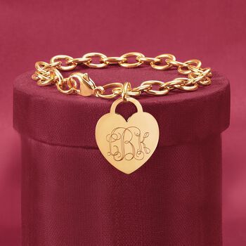 Ross-Simons - Monogram Italian 14kt Yellow Gold Heart Charm Bracelet. 8". Our classic 14kt yellow gold cable link bracelet with a heart charm is a lovely piece that dresses up any ensemble! Charm comes personalized with monogram in block or script. Made in Italy. Lobster clasp, 14kt yellow gold bracelet. Elegant Gold-tone Bracelets For Valentine's Day, Elegant Gold-tone Bracelet For Valentine's Day, Classic Heart Charm Bracelet, Elegant Personalized Heart Pendant Bracelet, Classic Heart-shaped Chain Bracelet As Gift, Classic Heart-shaped Chain Bracelet Gift, Classic Heart-shaped Chain Bracelet For Valentine's Day, Classic Heart Shaped Chain Bracelet As Gift, Classic Heart Chain Bracelet For Valentine's Day