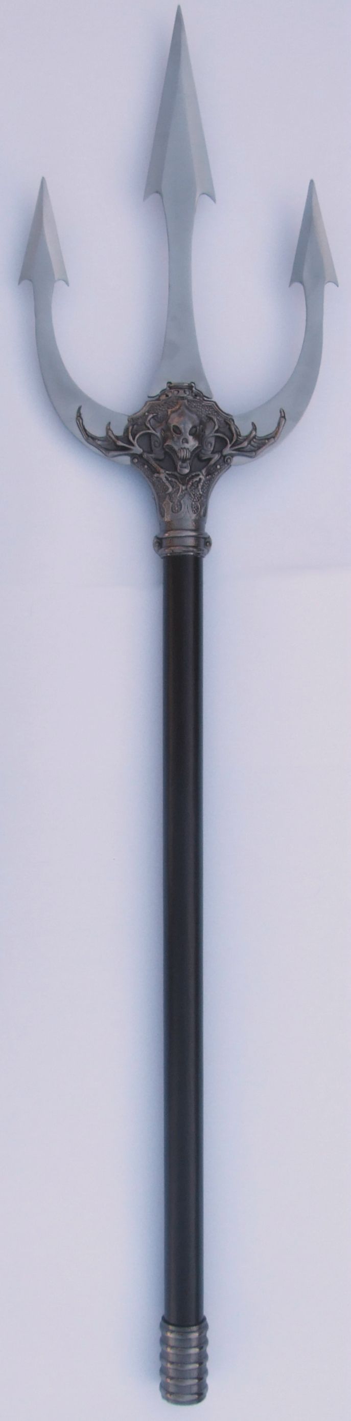 an old fashioned metal pole with four arrows on it's head and two sides