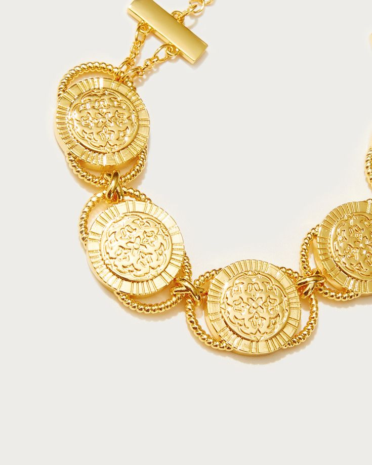 Intertwining strings, golden coins with Persian floral prints engraved on them... Yes, there’s a vintage totem vibe here. The blend of lines and circles, topped with delicate craftsmanship, makes this bracelet a show-stopper. Rock it up! Whether you're in the mood for retro vibes or bohemian vibes, you’ll own it effortlessly.💫💛 Materials: 18k Gold Plated Brass Measurements: 165mm/6.5" in length, 20mm/0.79" in extension length. Golden Coin, Retro Vibe, Dream Jewelry, Styl Vintage, Arm Band, 18k Gold, Gold Plate, Floral Prints, Bracelet