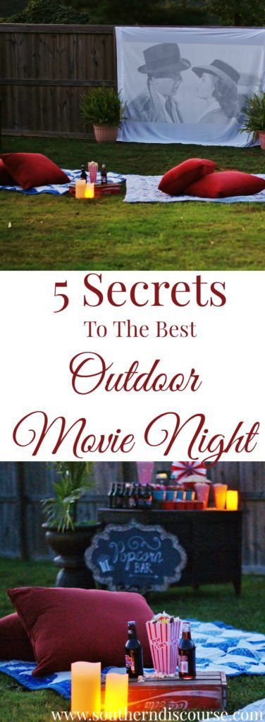 an outdoor movie night with candles and movies on the grass