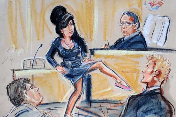 a courtroom scene with a woman sitting on the bench and two men standing behind her