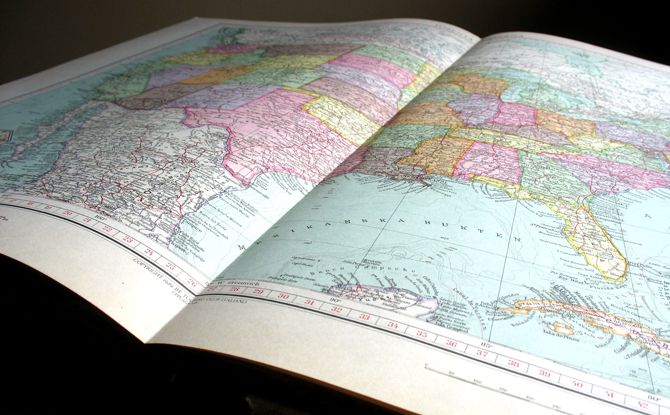 an open book with a map on it