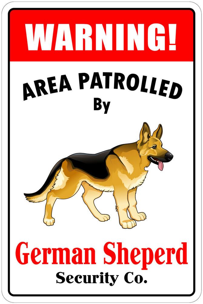 a german shepherd warning sign with the words,'warning area patroled by '