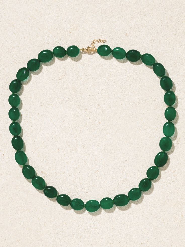 The stones used in JIA JIA's jewelry are carefully hand-selected, making each piece truly one-of-a-kind. This necklace is made from gold and strung with vibrant emerald quartz. Adjust the chain between 16- and 17-inches, depending on your neckline and other styles you may layer it with. Fine Jewelry Jade With 17 Jewels, Fine Jewelry Gemstone Necklaces With Round Beads, Elegant Round Jade Beaded Necklaces, Classic Jade Jewelry For May Birthstone, Fine Jewelry Necklaces With Round Gemstone Beads, Elegant Adjustable Emerald Gemstone Necklace, Luxury Green Onyx Gemstone Jewelry, Green Polished Round Beads Jewelry, Oval Jade Gemstone Beads Jewelry