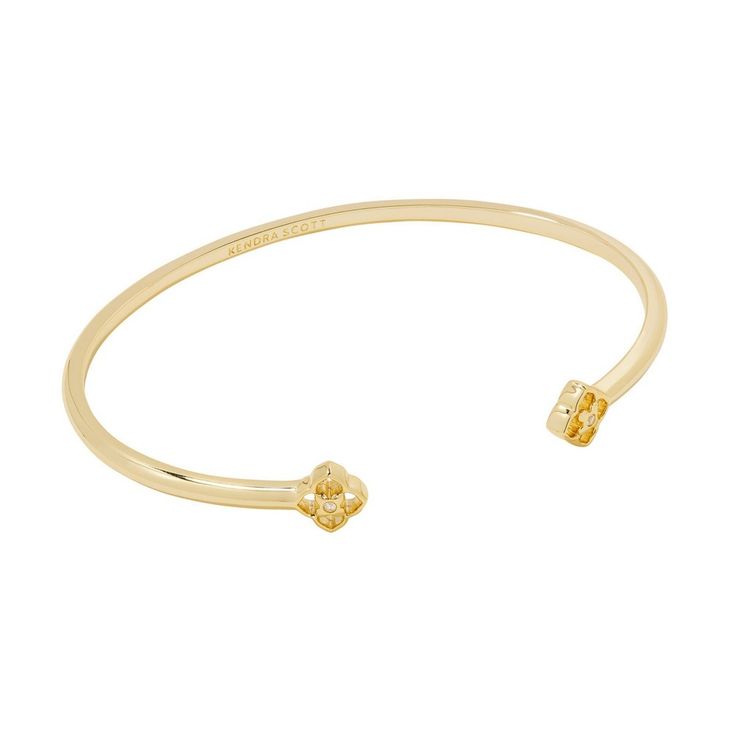 Build up your bracelet stack with the Iris White Cuff Bracelet. White crystal studs bookend a sleek metal cuff for a dazzling shine. An added bonus? The cuff is adjustable, meaning you can customize your fit. Designer, founder, and philanthropist Kendra Scott started her company in 2002, just three months after her first son was born. Her commitment to innovation, quality, customer service, and detail has taken her from a small startup to a billion-dollar brand. Kendra Scott is known for its des Fun Gold Jewelry, 90s Aesthetic Jewelry, Gold Bracelets For Women’s, Jewelry Bangles, Gold Jewelry Bracelet, Gold Bangle Bracelets, Non Tarnish Gold Jewelry, Cute Dainty Jewelry, Summer Jewelry Stack