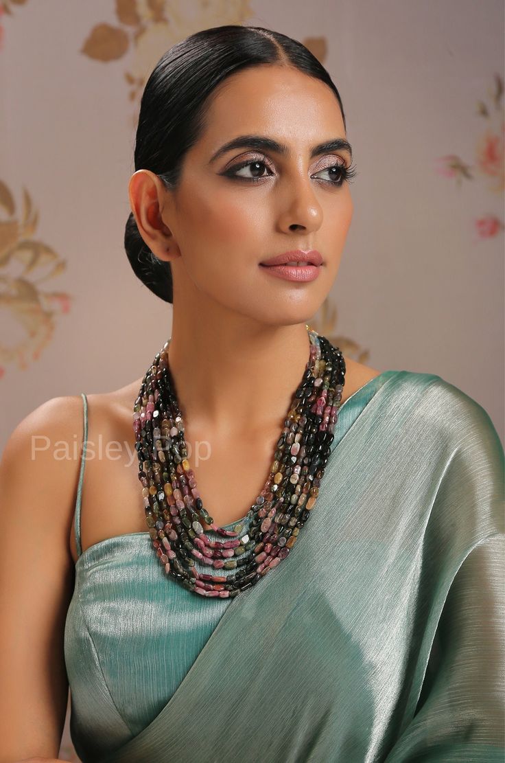 The multicolored stone necklace is flawlessly handcrafted by the artisans of India to celebrate beauty with the heritage of rich old Indian Jewelry. The five-layered long necklace plated has colorful semi-precious gemstones to give you color therapy. Add this statement beads necklace to your style and make your mark in all your festive or contemporary ensembles. Necklace Closure - Adjustable Dori Style Tip - This design is a perfect intersection of bohemian and traditional, put together thoughtf Beads Indian Necklace, Luxury Multi-stone Necklaces For Celebrations, Semi Precious Beads Necklace, Luxury Multi-stone Classic Necklaces, Semi Precious Stone Necklace, Festive Multicolor Gemstone Beads Jewelry, Multicolor Gemstone Bead Necklaces For Festive Occasions, Festive Multicolor Gemstone Bead Necklaces, Multicolor Kundan Necklace With Gemstones