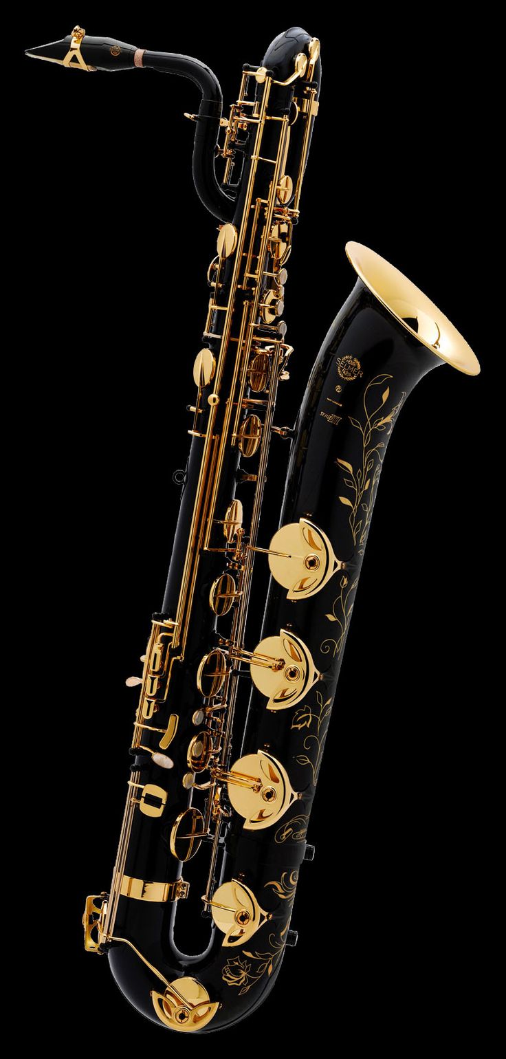 a black and gold saxophone on a black background