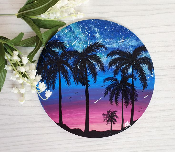 a painting of palm trees and the night sky