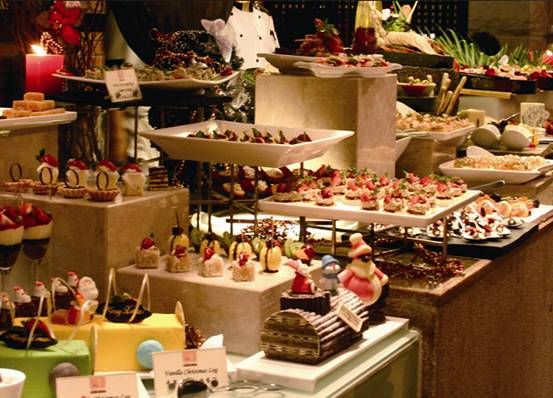 an assortment of desserts and pastries on display