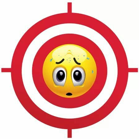 a yellow smiley face with big eyes in the center of a red target