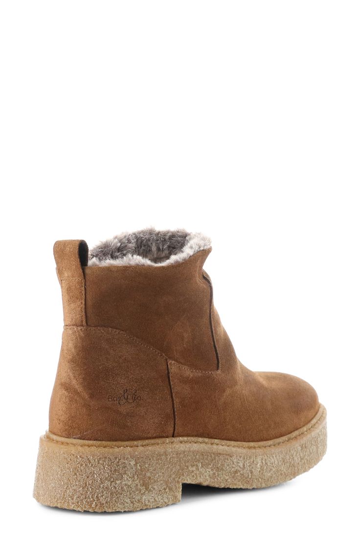 Bring cozy style to winter looks with a suede bootie that offers waterproof protection and insulated warmth with wool and faux-fur lining. Waterproof: protects against rain, puddles and slush to keep feet dry in wet conditions 1 3/4" heel; 1" platform 4 1/2" shaft Pull-on style Memory foam cushioning Temperature rated to -13°F/-25°C Leather upper/wool and faux-fur lining/rubber sole Made in Portugal Cozy Style, Cozy Fashion, Suede Booties, Winter Looks, Bootie, Memory Foam, Rubber Sole, Faux Fur, Leather Upper