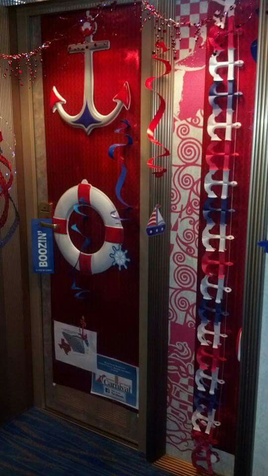 an open door decorated with red, white and blue streamers in the shape of an anchor