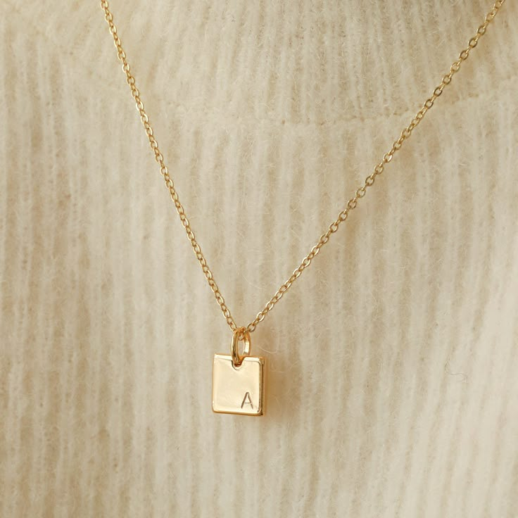 "This dainty gold necklace will be your new go-to minimalist pendant necklace! Personalize it with your or your loved one's initial - we stamp it for you. Made out of high quality gold plated & gold filled materials and perfect for everyday wear. It is an excellent layering necklace and is great as a gift for your friends and yourself! Other Personalized Necklaces: https://www.etsy.com/shop/AyouJewelry?section_id=31672095 D E T A I L S * 16K gold plated pendant * 14K gold filled necklace --- Gold Sentimental Initial Necklace, Cheap Sentimental Initial Pendant Necklace, Affordable Minimalist Initial Necklace As Personalized Gift, Cheap Minimalist Initial Necklace For Personalized Gift, Gold Necklace For Boyfriend, Initial Pendant Necklace Relationship, Minimalist 14k Gold Filled Initial Necklace Gift, Minimalist Personalized Charm Necklace For Her, Personalized Minimalist Charm Necklaces For Her