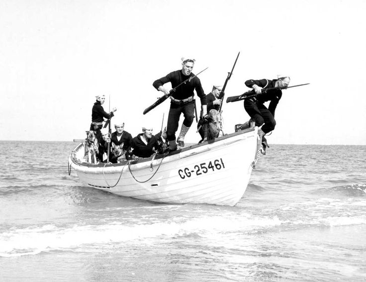 *United States Coast Guard beach patrols drill with their sentry dogs at Hilton Head, South Carolina, United States, circa 1943. Coast Guard Boats, Coast Guard Ships, Coast Guard Stations, Military Working Dogs, Wwii Photos, Us Coast Guard, United States Military, Military Life, Navy Ships